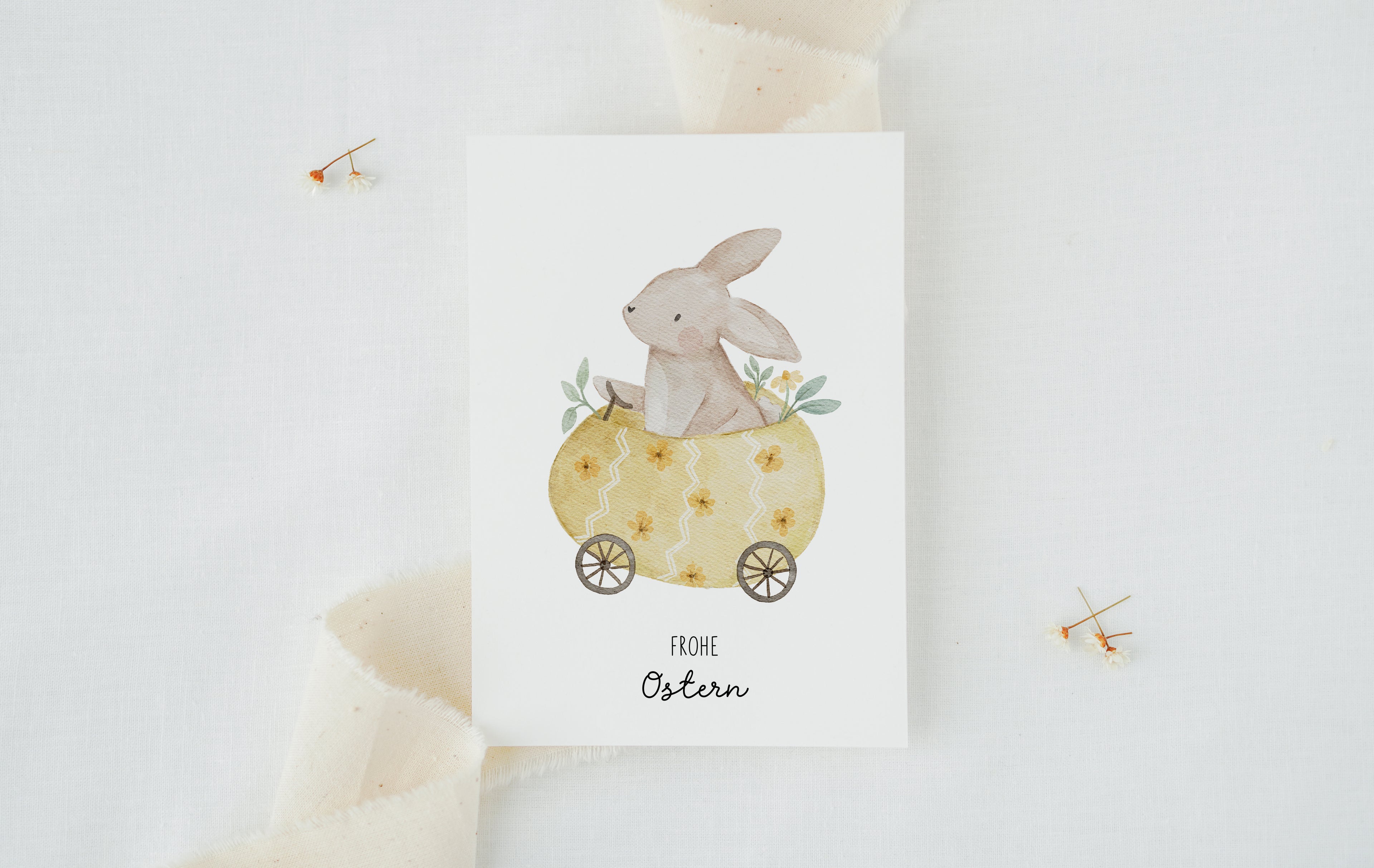 Osterkarte Hase im Osterei-Auto