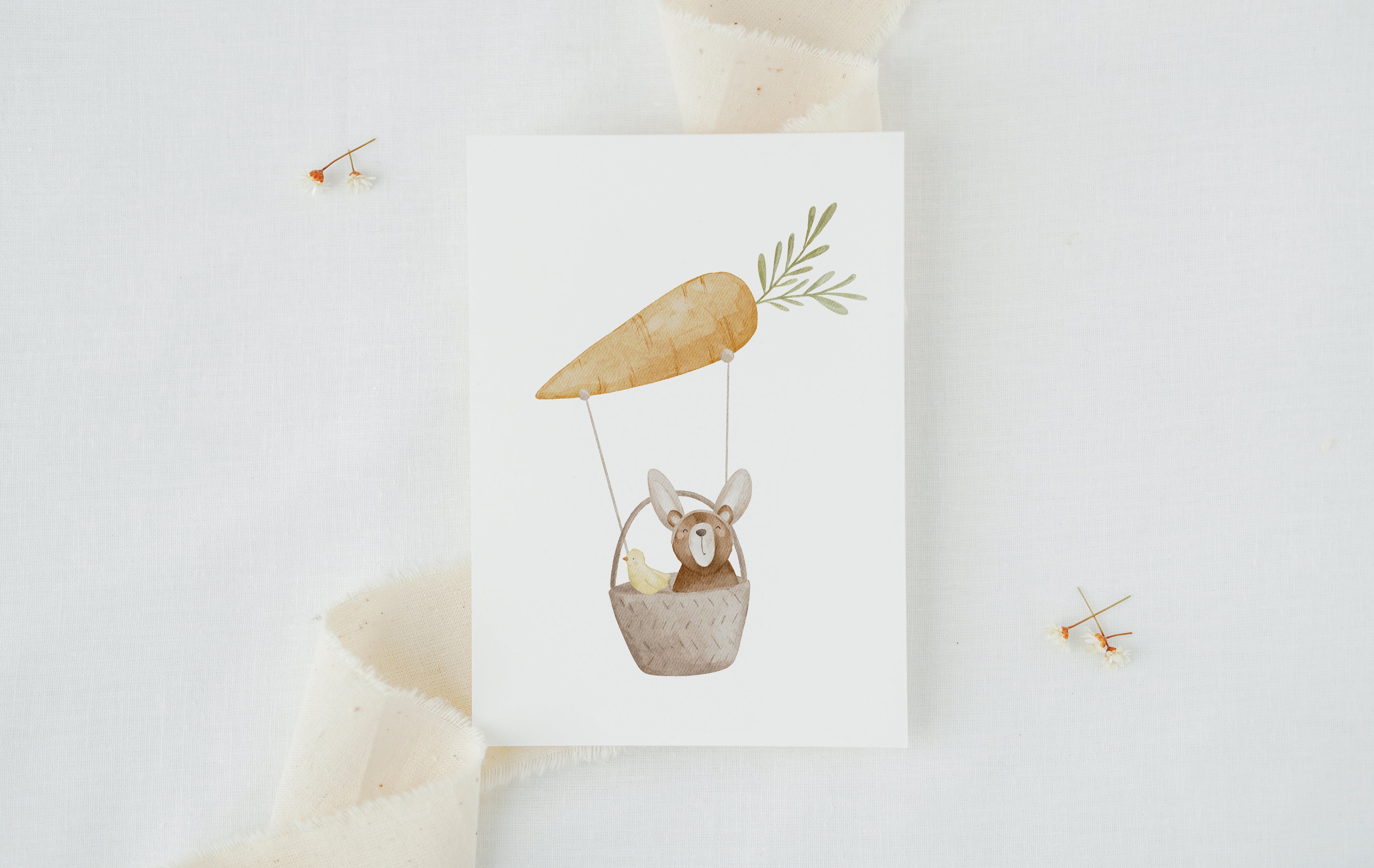 Osterkarte Bär und Küken im Karottenheißluftballon