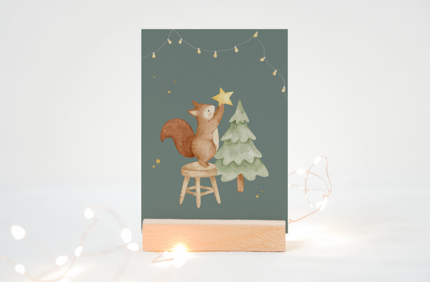 Weihnachtskarte Eichhörnchen mit Tannenbaum / Türkisgrün