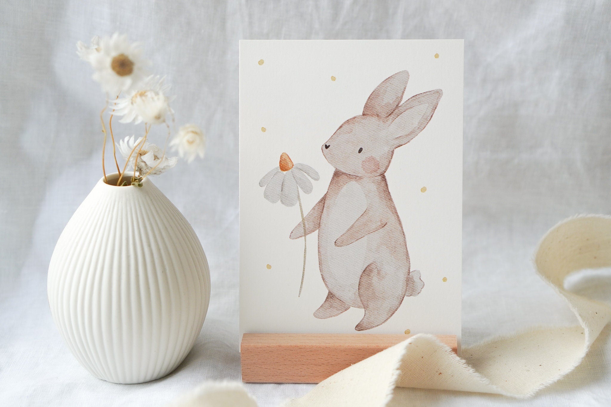 Osterkarte Hase mit Blume