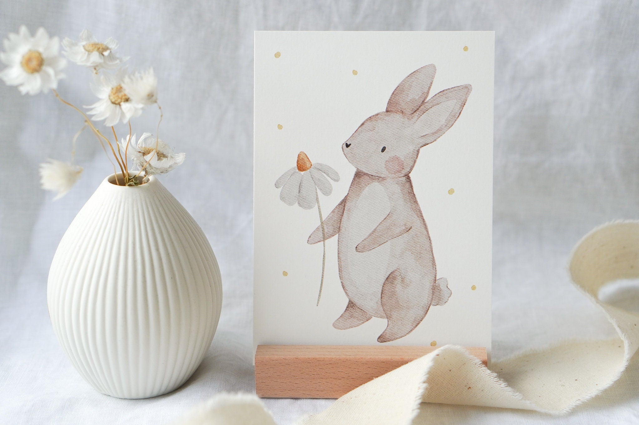 Osterkarte Hase mit Blume