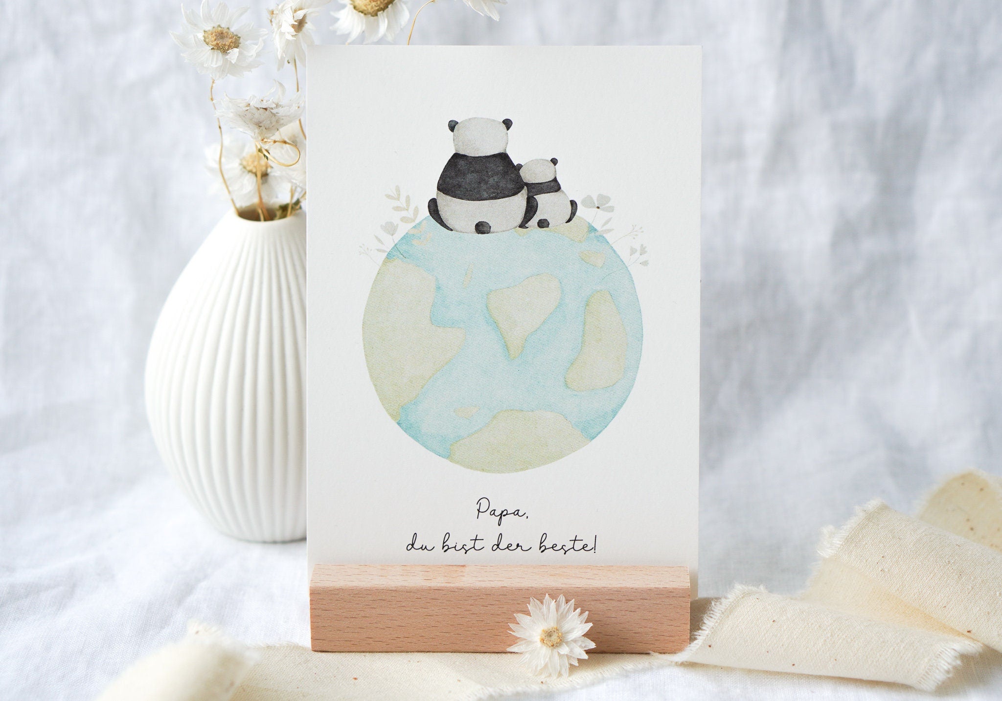 Karte Pandas auf Weltkugel "Du bist meine Welt" / "Mama du bist die beste!" / "Papa, du bist der beste!"