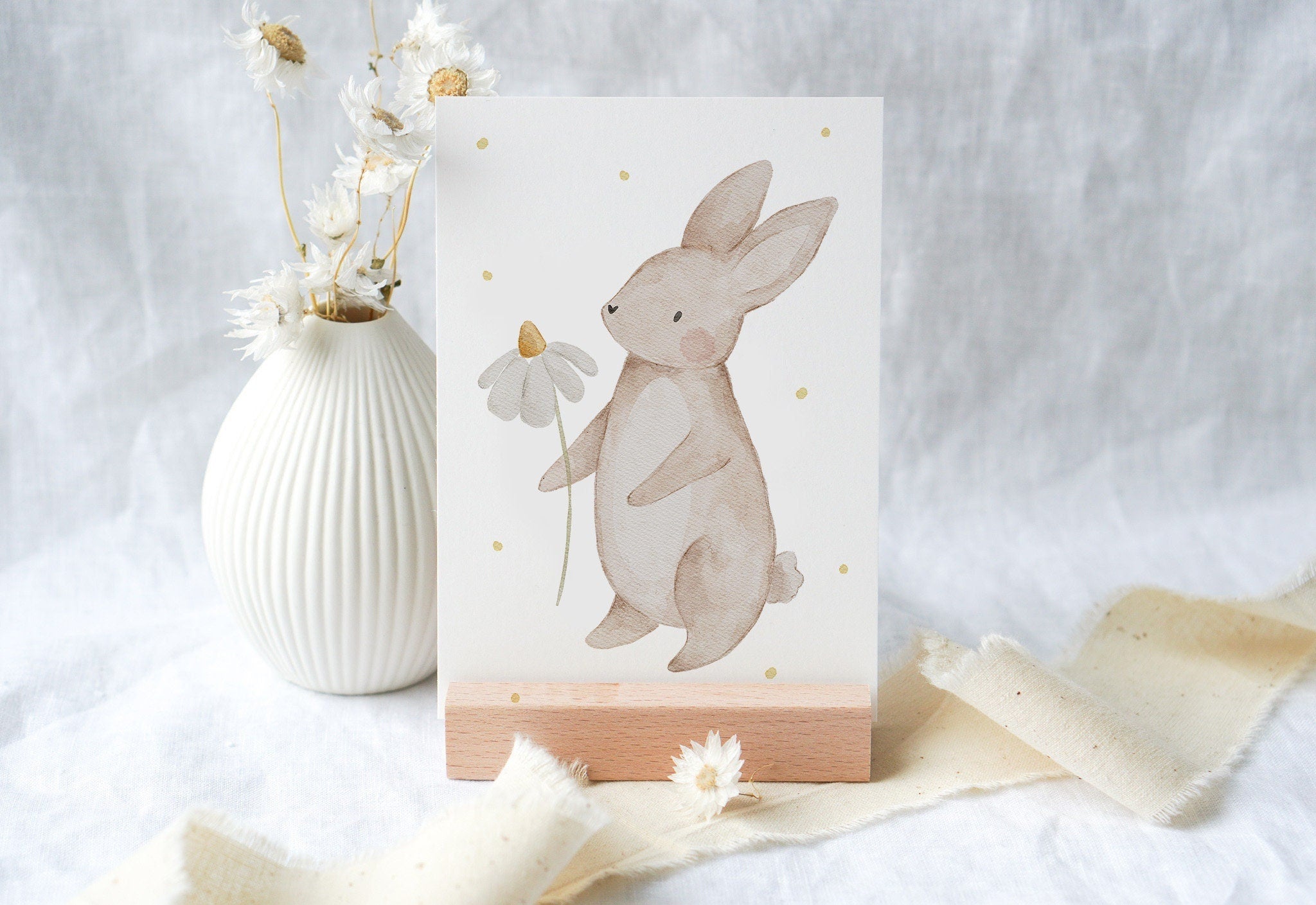 Osterkarte Hase mit Blume