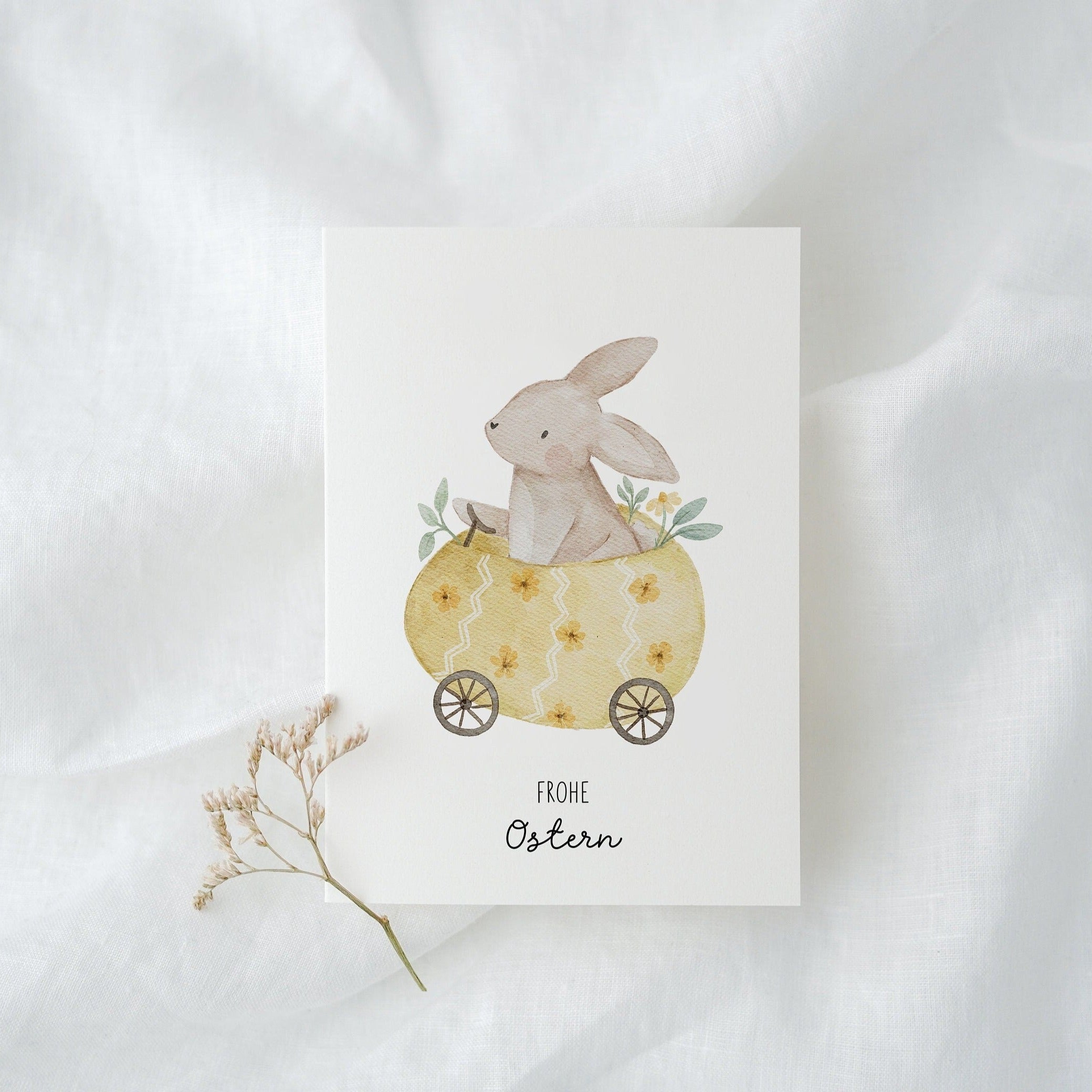 Osterkarte Hase im Osterei-Auto