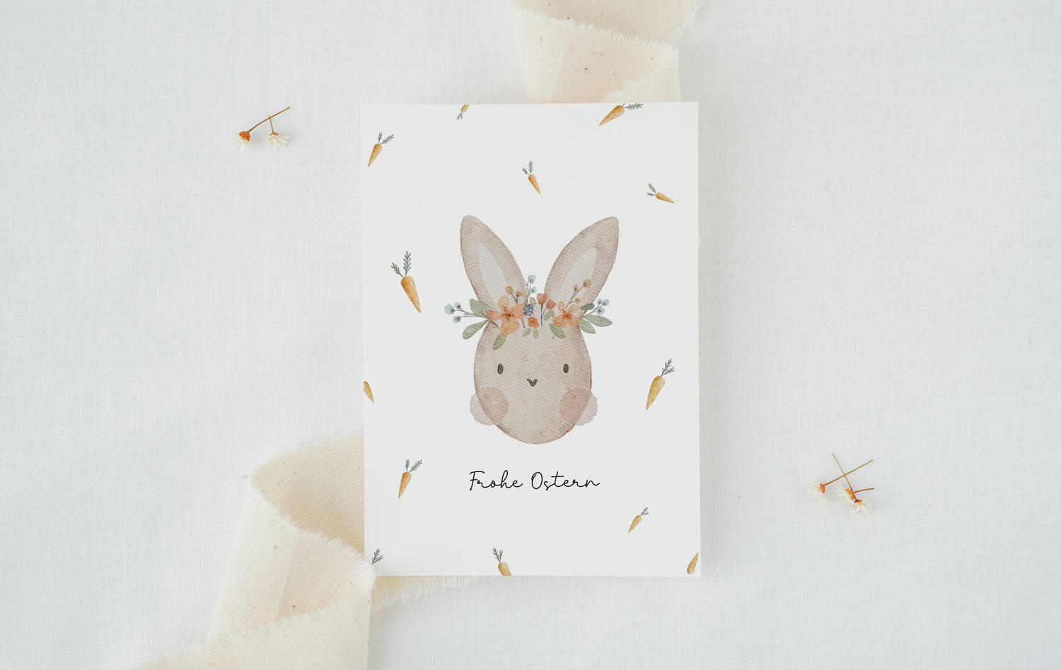 Osterkarte Hase mit Karotten