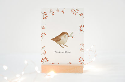 Weihnachtskarte Vogel mit Tannenzweig