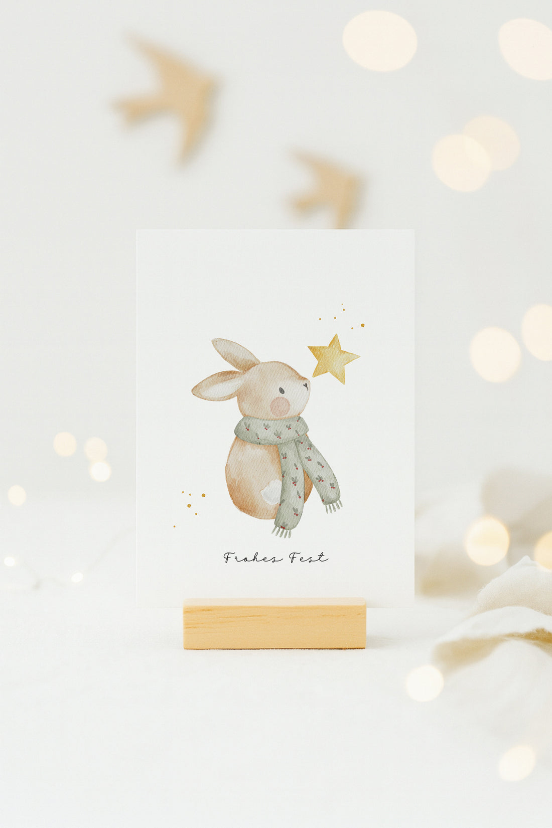 Weihnachtskarte Hase mit Stern / Hellblau