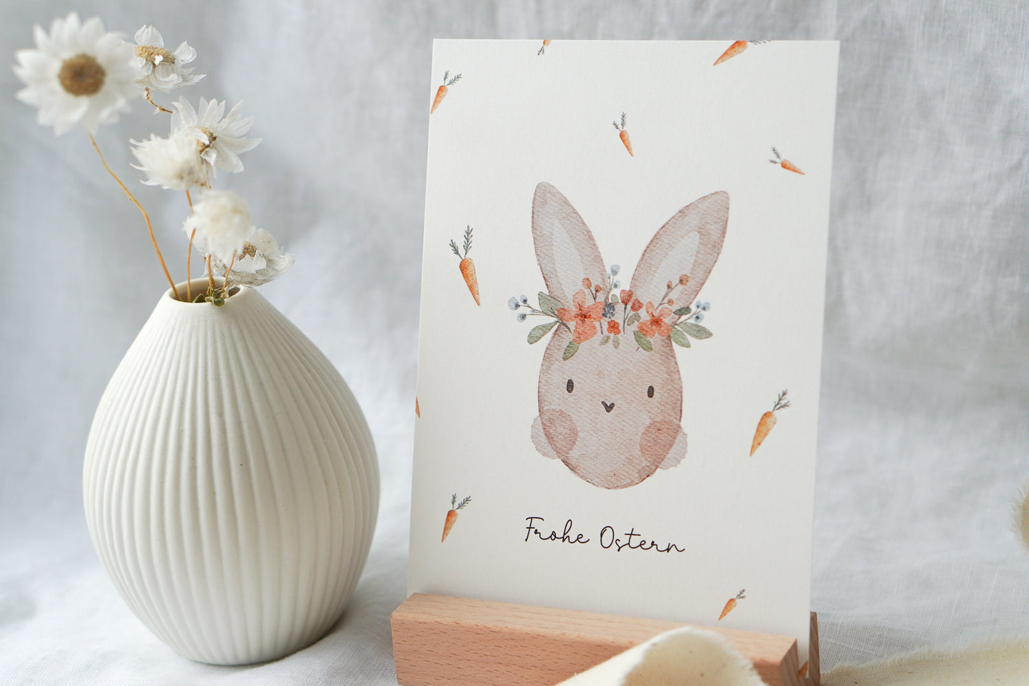 Osterkarte Hase mit Karotten