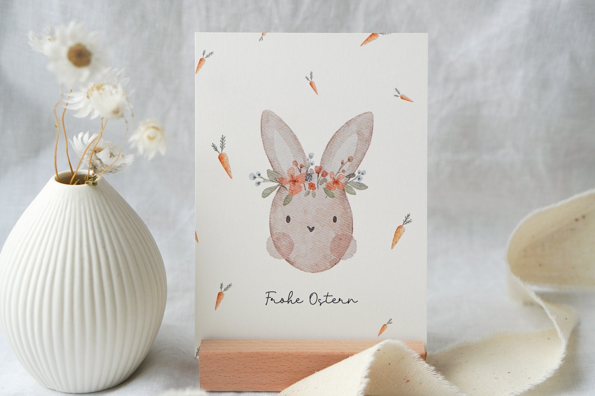 Osterkarte Hase mit Karotten