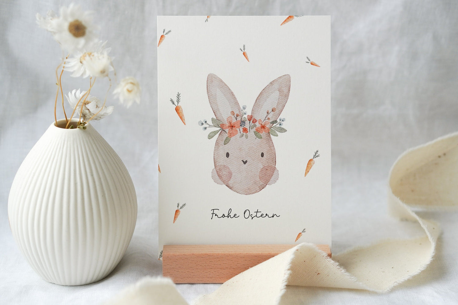 Osterkarte Hase mit Karotten