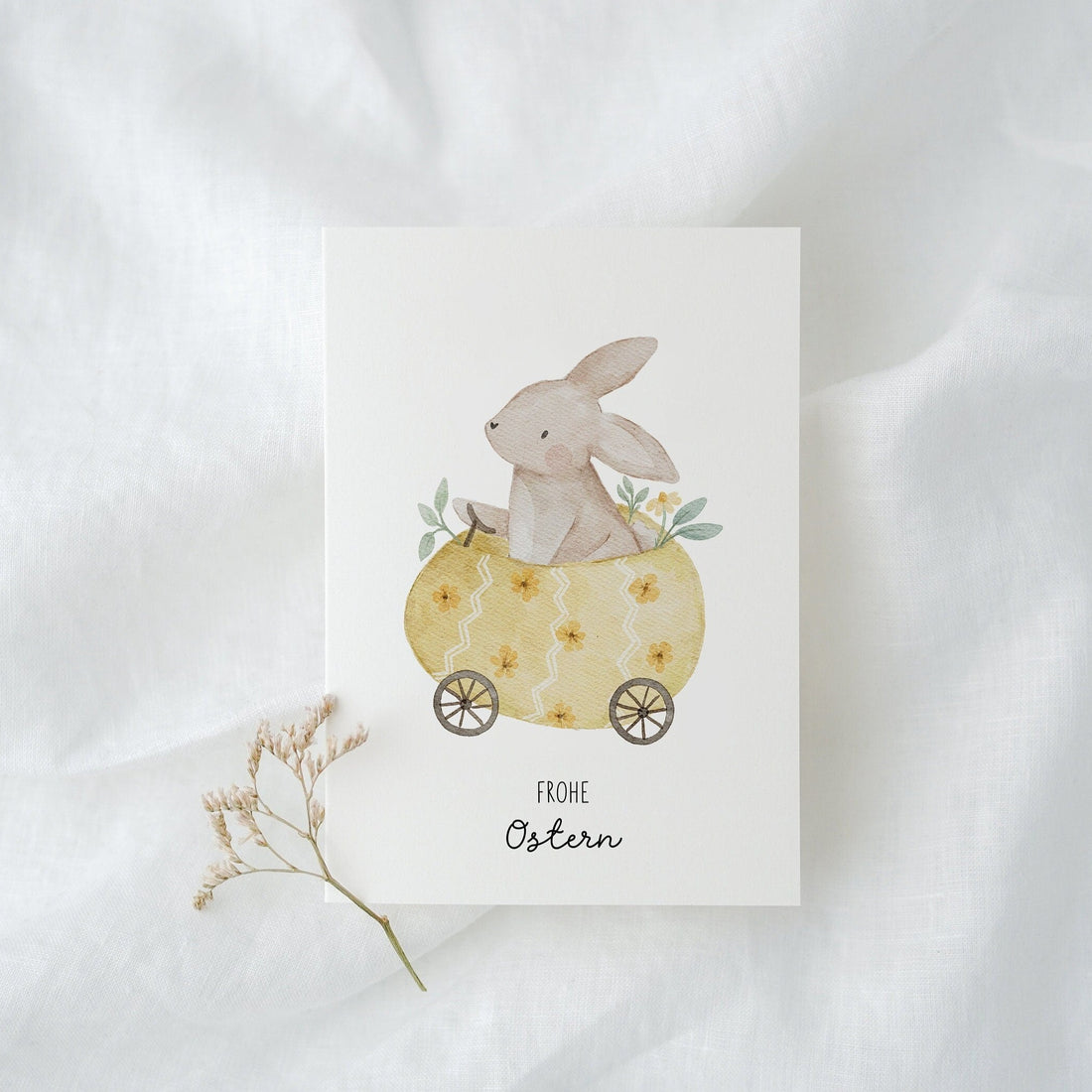 Osterkarte Hase im Osterei-Auto